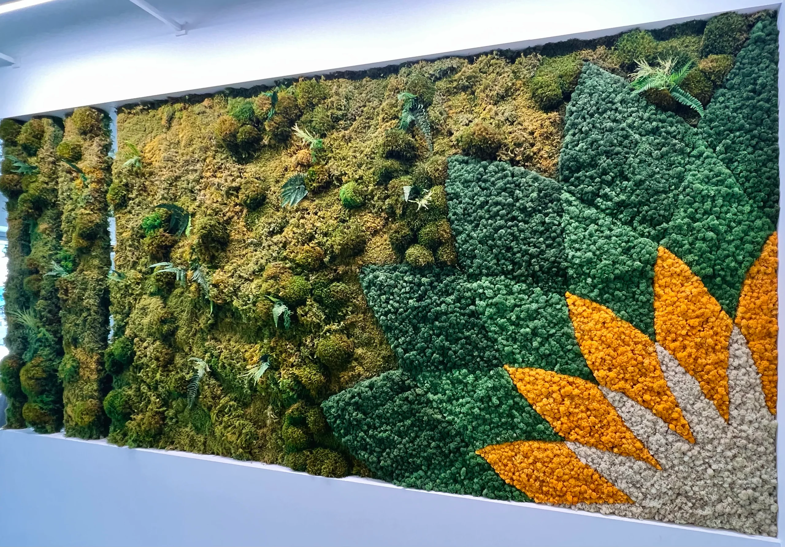 Moss wall with orange sunburst