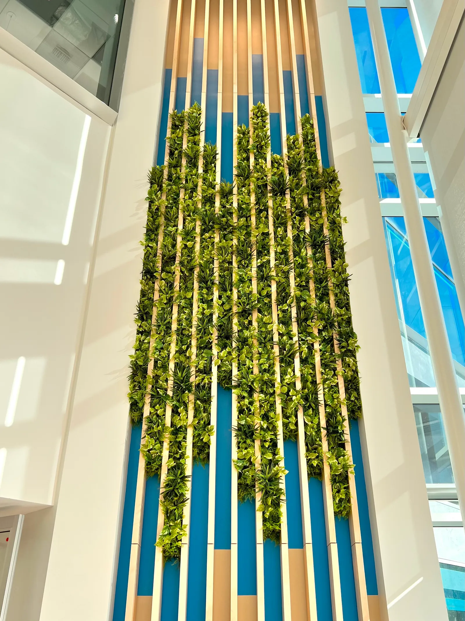 Tall wall feature with silk greenery