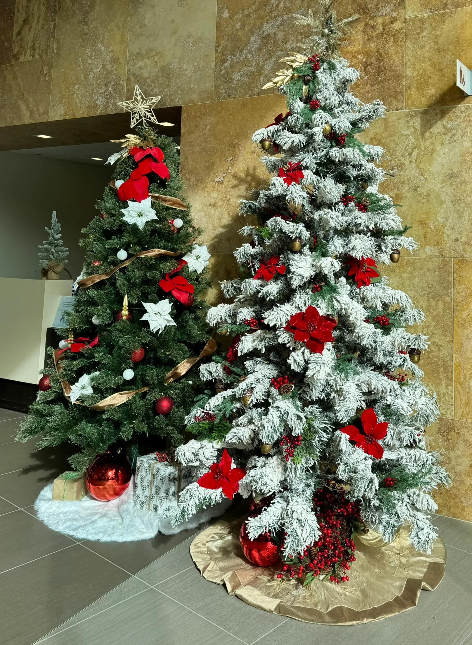 Decorated holiday trees in a lobby